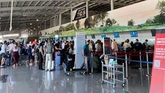 International travel's current hurdles: Travelers waiting to produce proof of a negative Covid-19 test in Costa Rica.