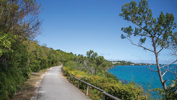 Bermuda's Railway Trail, which runs 18 miles from end to end of the island, follows an abandoned railbed that can be explored by foot or bike only. Bermuda's Railway Trail, which runs 18 miles from end to end of the island, follows an abandoned railbed that can be explored by foot or bike only.