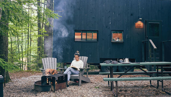 A fire pit and seating area outside a Getaway Eastern Catskills cabin in upstate New York. A fire pit and seating area outside a Getaway Eastern Catskills cabin in upstate New York.