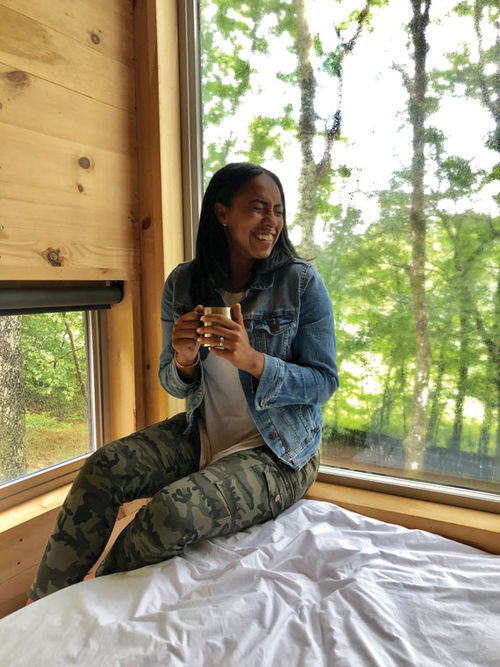 A traveler staying at a Getaway cabin. A traveler staying at a Getaway cabin.