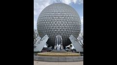 Epcot is in the middle of a transformation that is ongoing despite the pandemic. Here, a new fountain and pylons greet guests in front of the park's icon, Spaceship Earth.