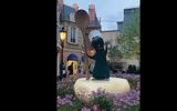 A topiary of Remy, the rat that stars in the forthcoming attraction Remy's Ratatouille Adventure, greets guests near the entrance to the France pavilion's expansion that will house the ride. The topiary is part of Epcot's Taste of Flower and Garden Festival, which runs through July 5 and showcases many feats of gardening around the park.