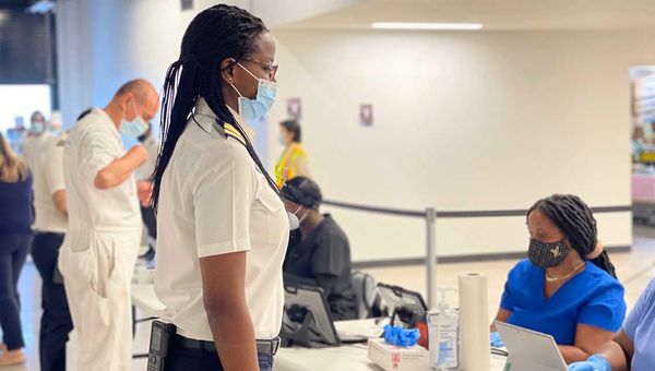 A Royal Caribbean officer at the vaccination site in PortMiami. The line said 900 officers and crew from the Navigator and Freedom of the Seas got the jab.