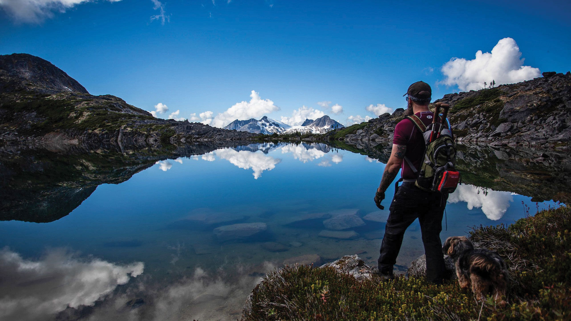 Skagway’s mayor, Andrew Cremata, pictured here hiking in the Skagway area, said that locals like him are mobilizing to get friends and family to come visit the cruise-dependent town this summer.