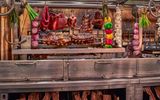 Open-fire roasting grills are used to prepare prime rib and other premier cuts.