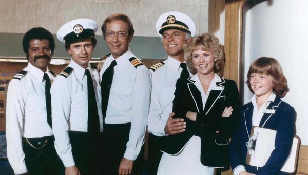 The original cast of "The Love Boat," with Gavin MacLeod as Captain Stubing, third from right.