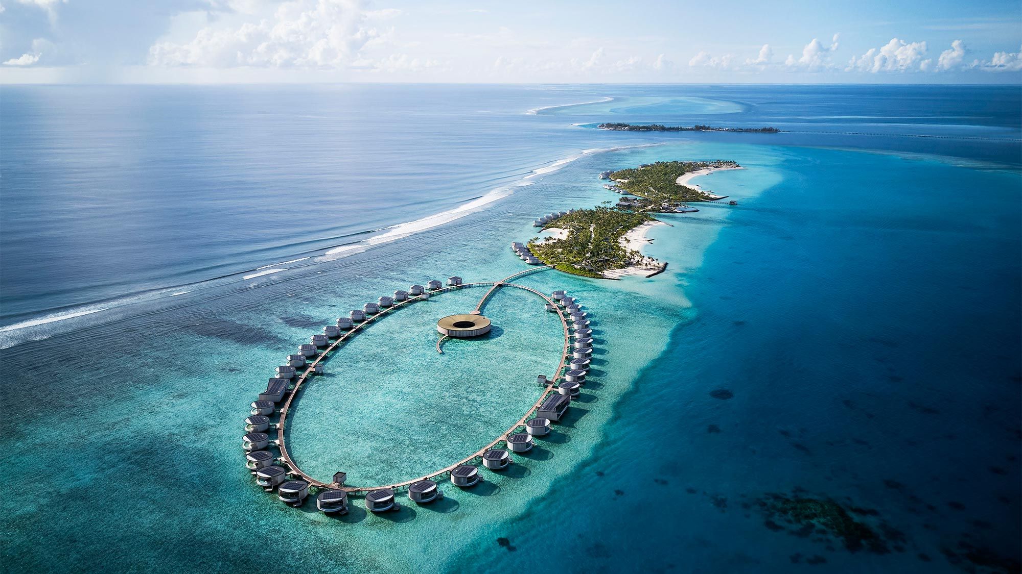 Villas at the new Ritz-Carlton Maldives Fari Island are located either on the beach or over water.