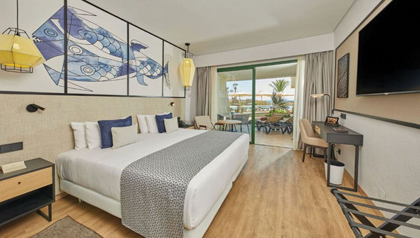 A guestroom at the Dreams Lanzarote Playa Dorada Resort & Spa. A guestroom at the Dreams Lanzarote Playa Dorada Resort & Spa.