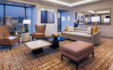 The living room of a one-bedroom entertainment suite in Las Vegas Hilton at Resorts World.