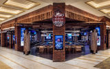 Dawg House Saloon & Sportsbook will feature live music and dancing, draft beers, creative cocktails and classic American pub fare with a Southern twist.