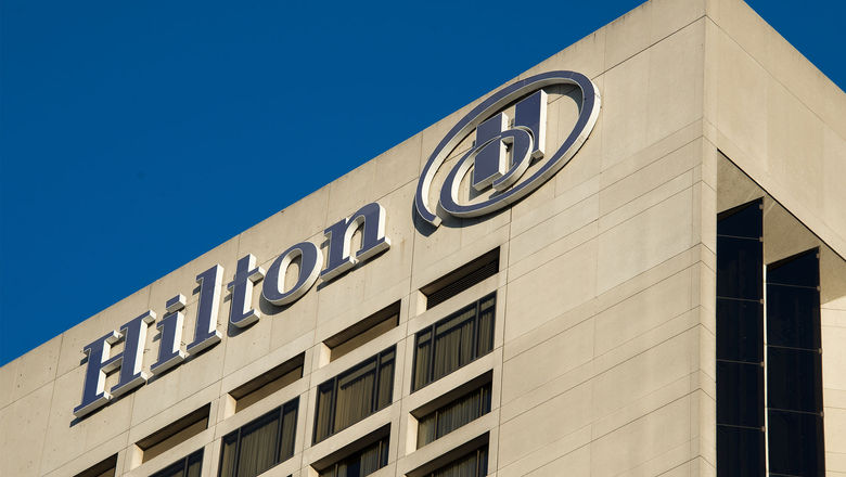 Hilton posted Q2 net income of $413 million, up from $367 million a year earlier.