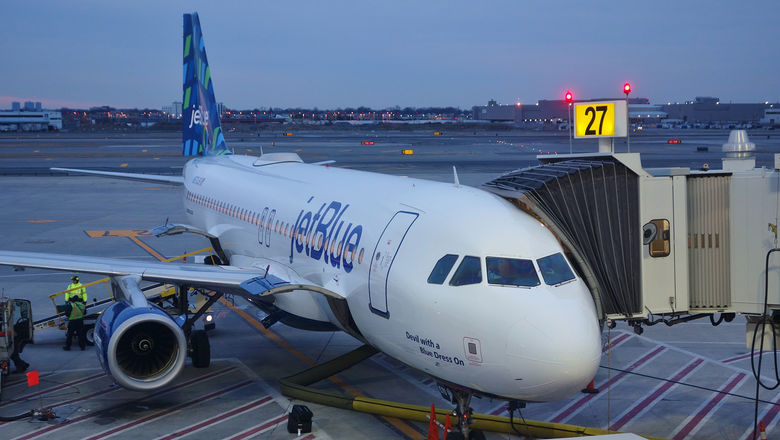 An Airbus A320 airplane from JetBlue at JFK's Terminal 5. The carrier controls 334 slots at the airport.