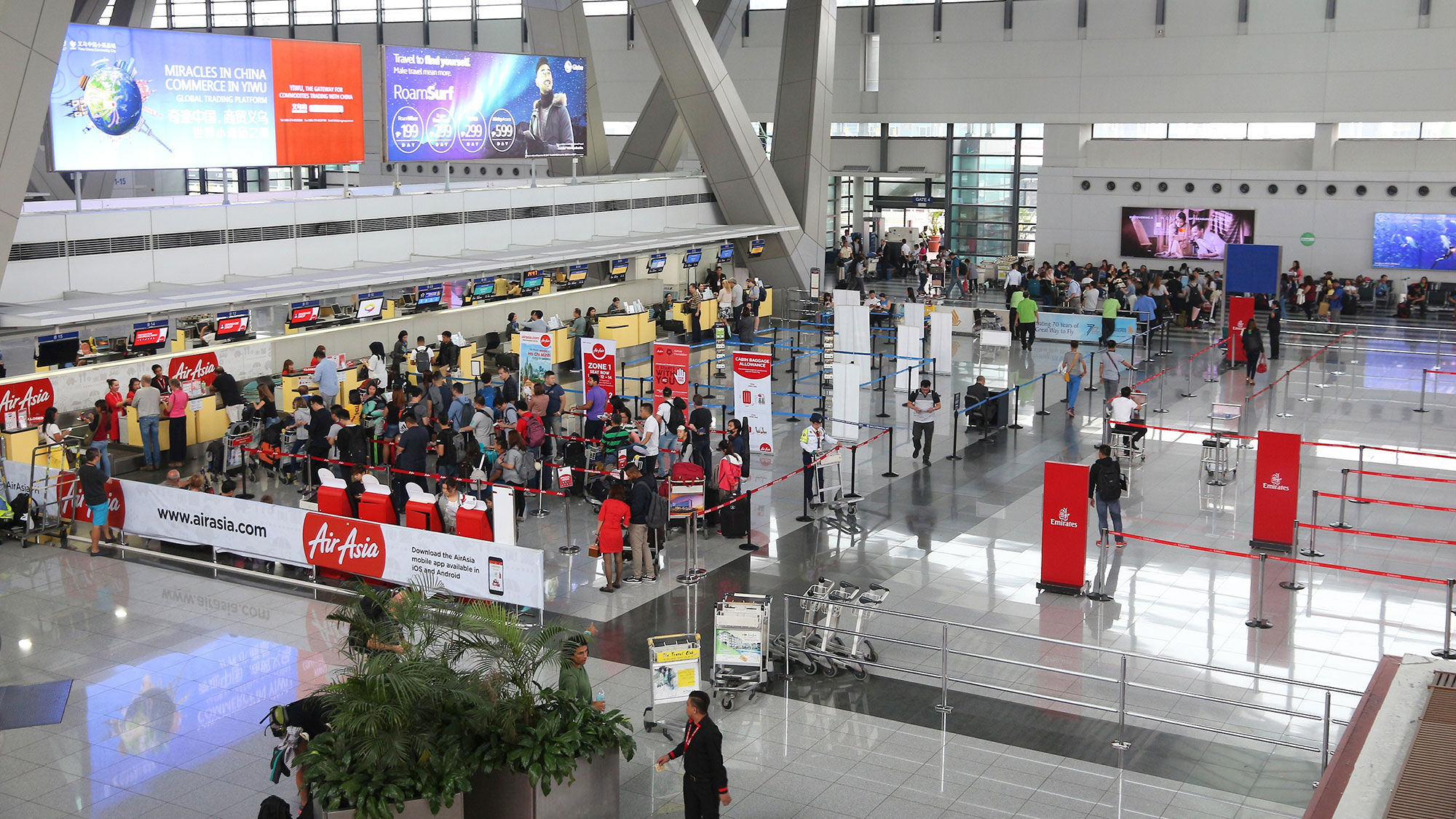 Passengers queued up at Ninoy Aquino Airport.