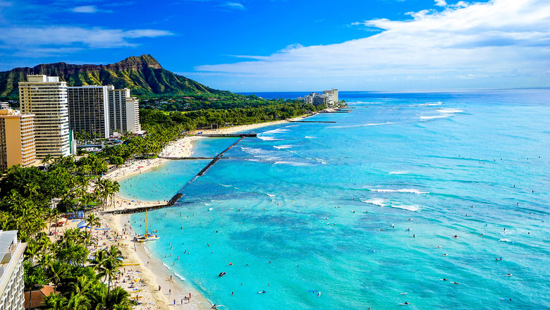 Waikiki on Oahu. Starting on March 26, U.S. domestic travelers to Hawaii will no longer need to show proof of vaccination or a negative Covid-19 test to bypass quarantine and enter the Aloha State.