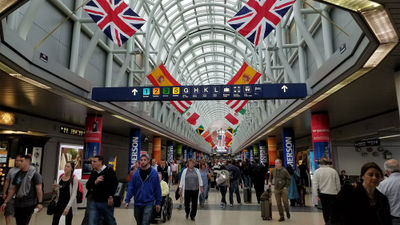 Flyers at Washington Reagan National Airport. Eight airlines are duking it out for the five additional daily roundtrip slot pairs that the DOT is authorized to award for flights beyond the 1,250-mile perimeter at the airport.