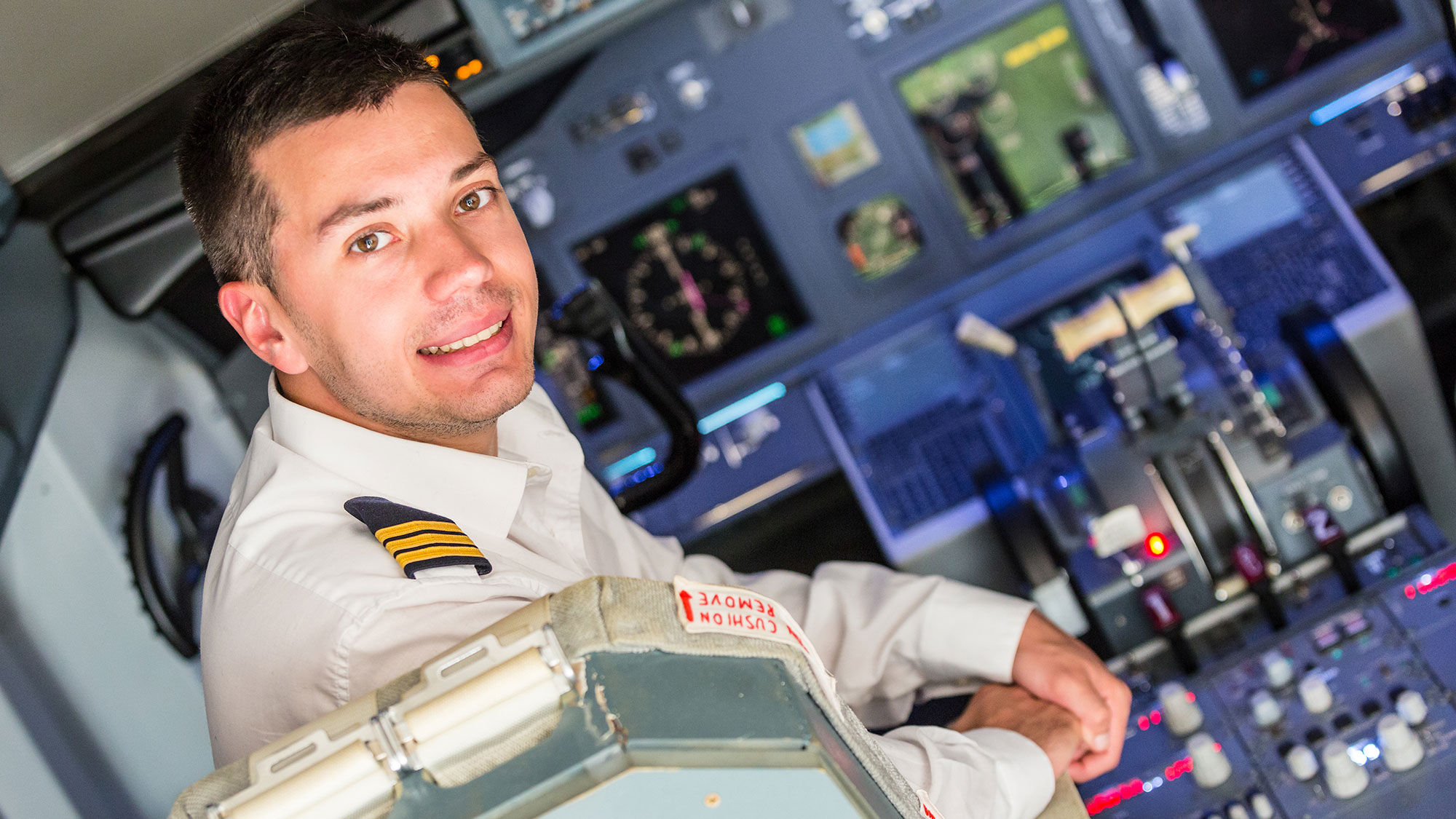 A young pilot in the cockpit.