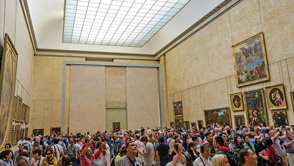 Multitudes take in the Mona Lisa and other paintings on display at the Louvre in Paris, where timed entry has become commonplace. Multitudes take in the Mona Lisa and other paintings on display at the Louvre in Paris, where timed entry has become commonplace.