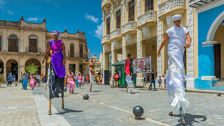 Performers on stilts in Plaza Vieja in the old town of Havana.