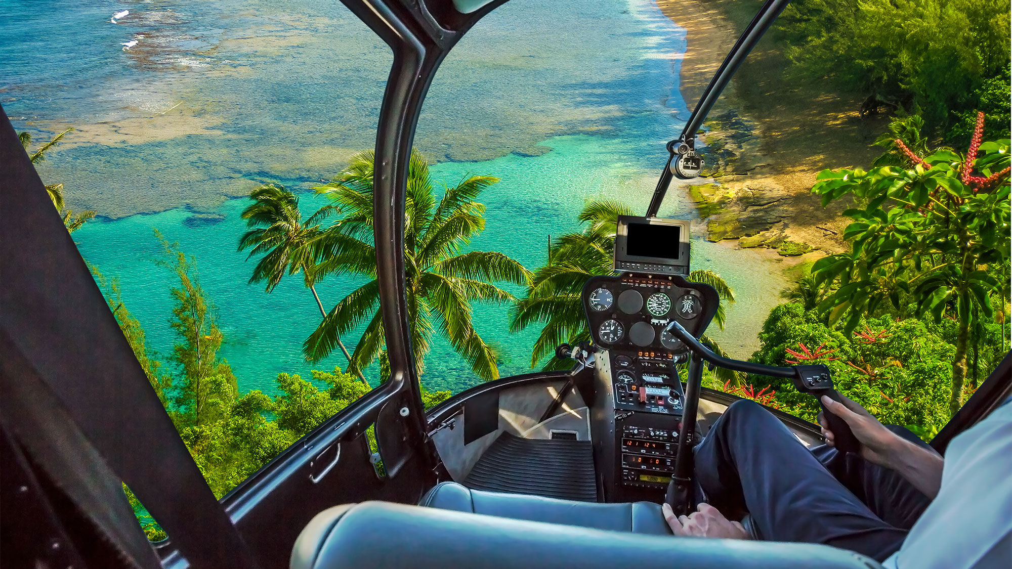 A view from the helicopter cockpit of of Kee Beach in Kauai.