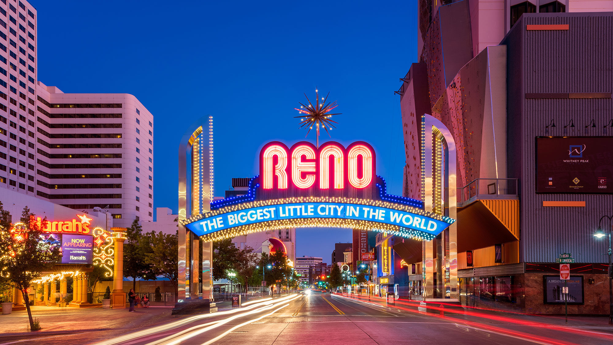 The historic Reno Arch, with the Harrah's casino on the left.