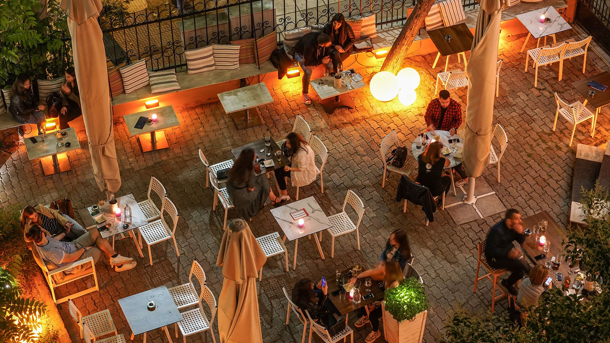 Before travelers enter a restaurant, the wellbeing director will make sure tables are spaced to ensure social distancing.