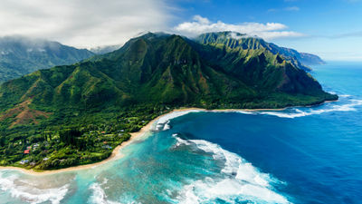 Napali Coast on Kauai. The island is great for travelers who are looking for more scenic wonders and unique adventures.