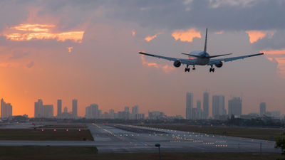 A plane coming in for a landing at Miami International Airport.