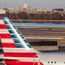 American Airlines says it is gradually winning back corporate business