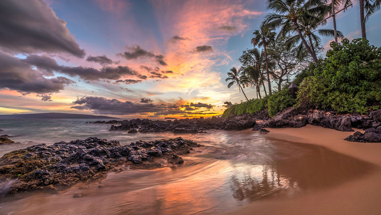 A beach on Lanai. A UHERO report highlights travel industry executives' concerns about declining competitiveness due to high costs, infrastructure issues, lack of marketing and negative public perceptions.