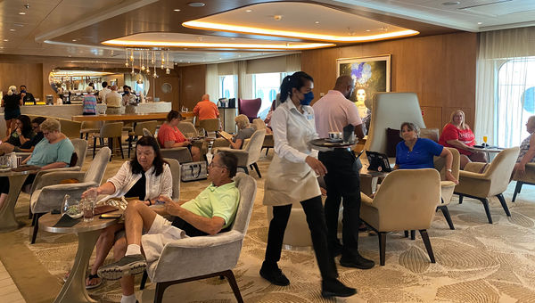 Passengers unwind at Cafe al Bacio. Passengers unwind at Cafe al Bacio.
