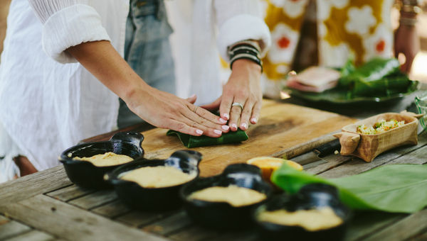 Participants in the Fire & Wine experience can roll up their sleeves and help prepare the meal. Participants in the Fire & Wine experience can roll up their sleeves and help prepare the meal.