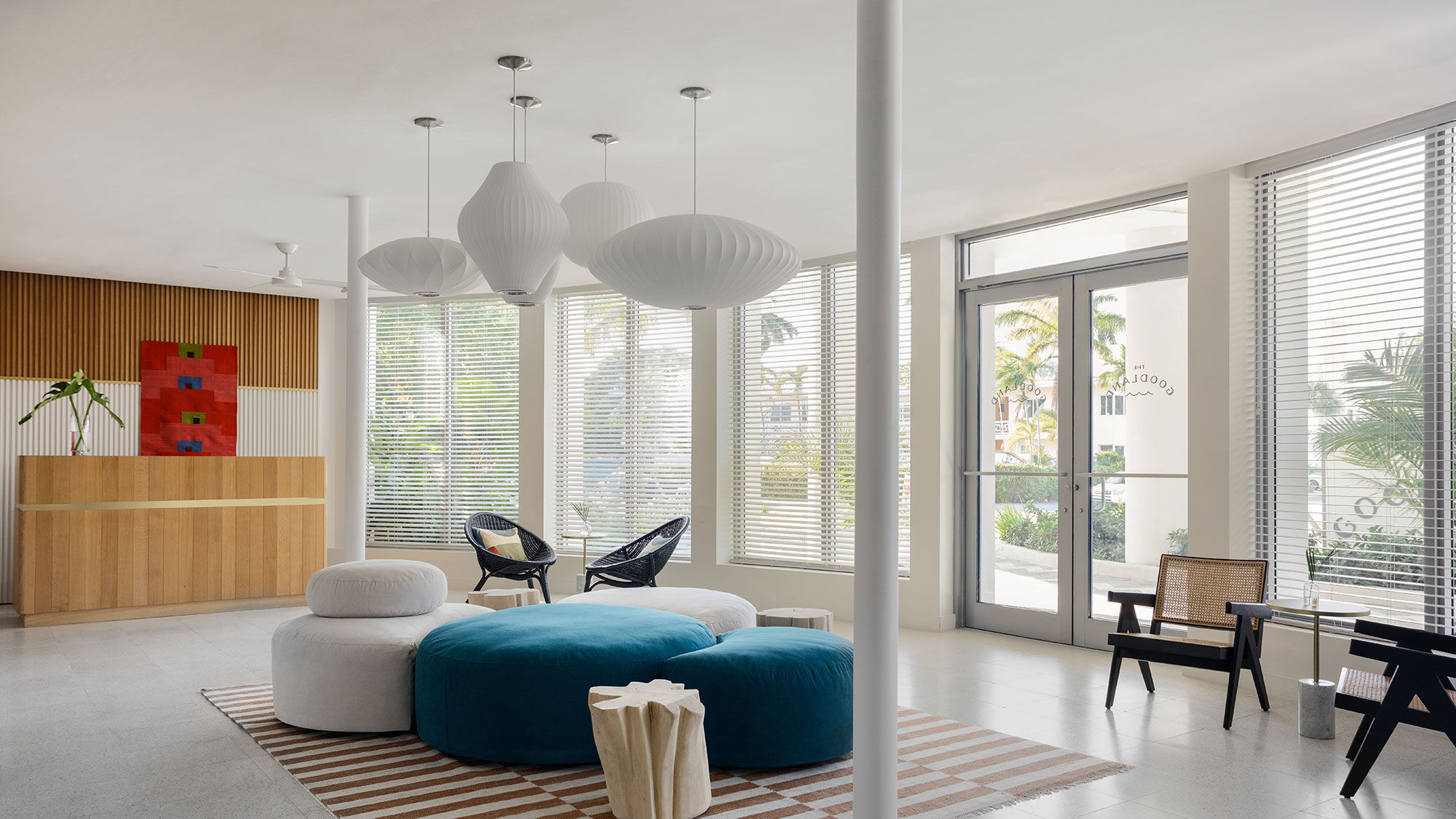 The midcentury modern style lobby of the Kimpton Goodland Fort Lauderdale.
