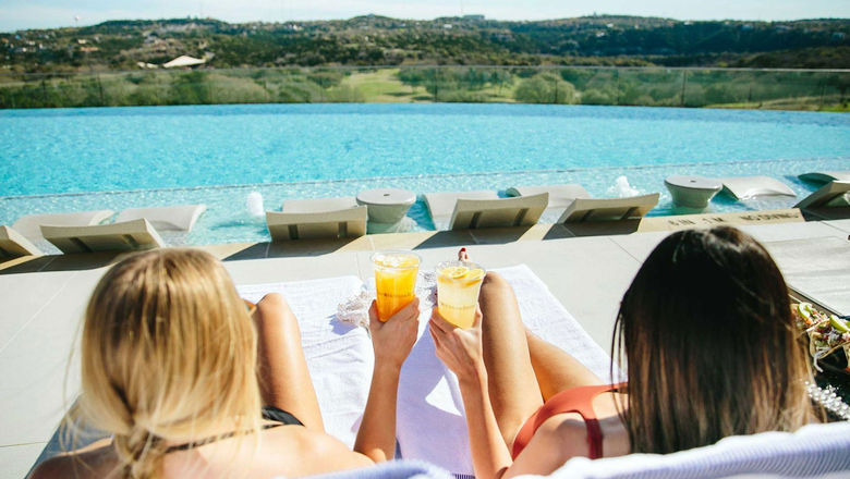 A ResortPass marketing image shows guests experiencing a poolside "daycation."