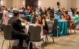 GTM's appointment room featured 115 tables which acted as advisors' desks during 52 one-on-one meetings.