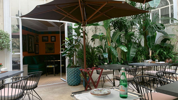 Courtyard for alfresco dining at the hotel.
