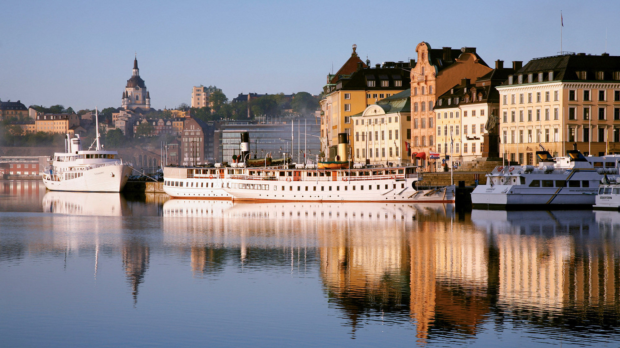 Boats along the Skeppsbron, Stockholm's oldest quay, which runs from Slussen past the Royal Castle.