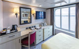 Cunard Line built both oceanview and inside Single Cabins onto the Queen Elizabeth and the Queen Victoria and added them to the Queen Mary 2 in 2015. Pictured here, an oceanview solo cabin on the QE.