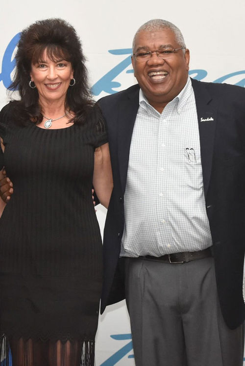 Gordy Silverman, left, with Unique Vacations executive vice president Gary Sadler.