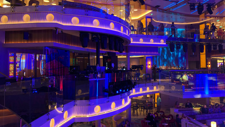 The ship’s Grand Central atrium is a place for large-scale entertainment, cruise ship games and lounging.