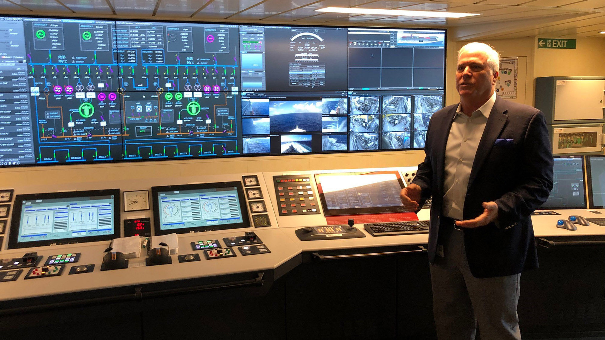Carnival Cruise Line vice president of environmental operations Rich Pruitt in the engine control room of the Mardi Gras.