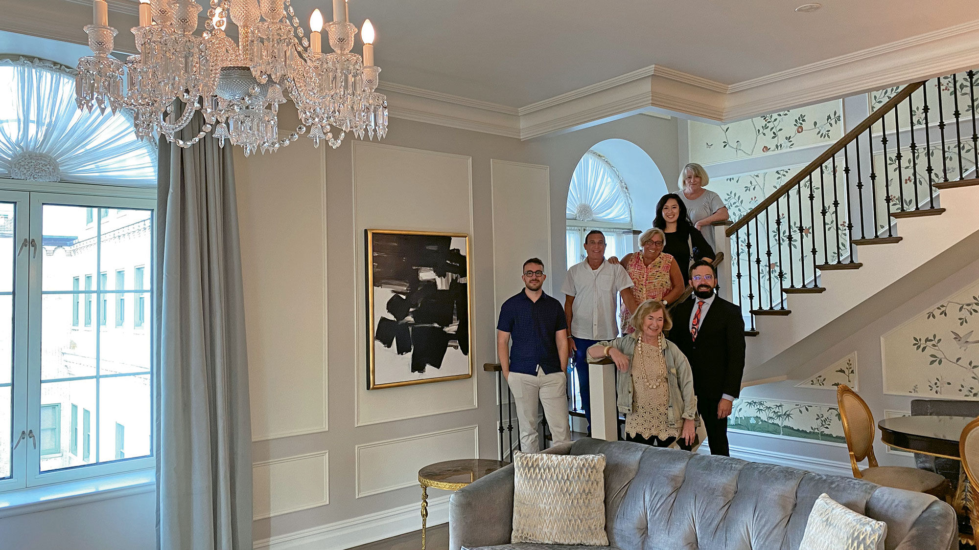 Attending Ovation Travel Group's Sunday in the City event at The Plaza were (from left, up the stairs) Jordan Albright, Harlee Rosenberg, Beverly Waldman, Travel Weekly's Christina Jelski and Denese Senno. From left, foreground: Ellie Colin and the Plaza's Markus Tscherner.
