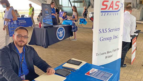 SAS Services Group Denver general manager Jorge Gonzalez at a recent job fair. The company provides wheelchair attendants for several airlines. SAS Services Group Denver general manager Jorge Gonzalez at a recent job fair. The company provides wheelchair attendants for several airlines.