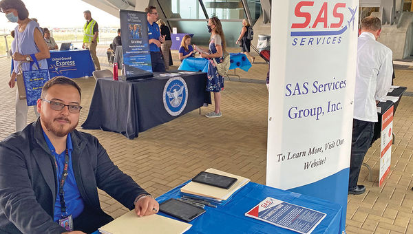 SAS Services Group Denver general manager Jorge Gonzalez at a recent job fair. The company provides wheelchair attendants for several airlines.