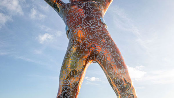 The chrome finish of the sculpture reflects light from sunrise to sunset. The chrome finish of the sculpture reflects light from sunrise to sunset.