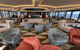 The Dome Lounge on Atlas Ocean Voyages' World Navigator.