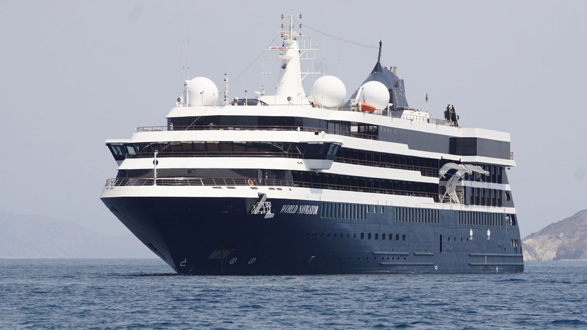 The World Navigator's maiden voyage was supposed to end in Egypt, but a passenger's positive Covid-19 test forced Atlas Ocean Voyages to return the ship to Greece.