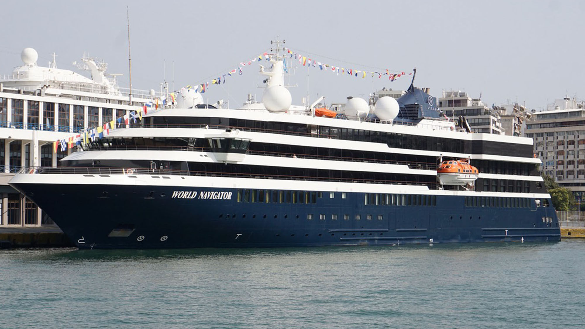 Atlas Ocean Voyages' World Navigator docked in Piraeus, Greece.