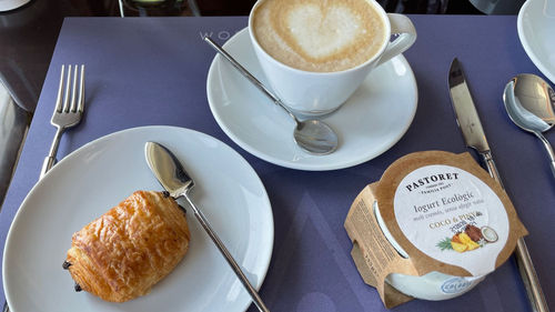 Pastoret yogurt and a pain au chocolat -- a satisfying breakfast on the World Navigator. Pastoret yogurt and a pain au chocolat -- a satisfying breakfast on the World Navigator.