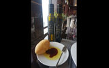 All tables are set for lunch with Atlas brand olive oil and balsamic vinegar to go with the beautiful bread selections.