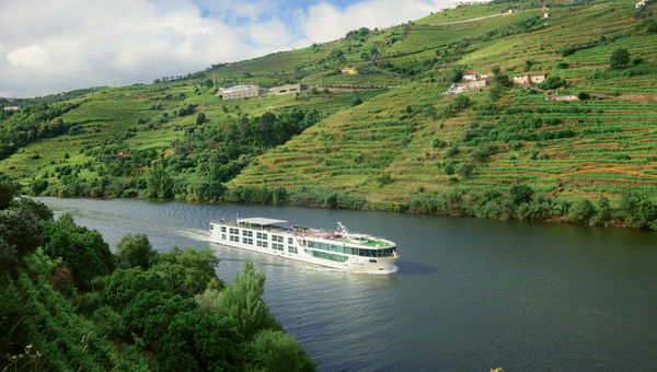 The Scenic Azure sailing through Peso da Regua on the Douro River in Portugal. The Scenic Azure sailing through Peso da Regua on the Douro River in Portugal.